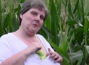 This obese mama loves to play in a cornfield